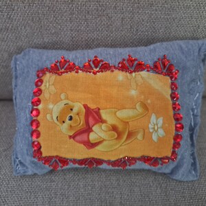 Cartera tipo clutch con personaje