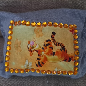 Cartera tipo clutch con personaje
