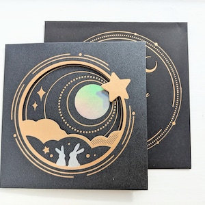 Conigli seduti sotto il cielo, luna piena, stella, biglietto pop-up, biglietto di nozze, 3D, biglietto di auguri, compleanno, San Valentino