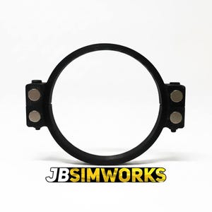 May include: A black circular ring mount featuring two side brackets, each equipped with two silver circular magnets. The object is positioned above the text JBSIMWORKS, which is written in a bold, yellow, and black font against a white background.