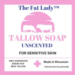 Puede incluir: Etiqueta rosa y blanca con el texto "The Fat Lady&trade; Tallow Soap Unscented For Sensitive Skin". La etiqueta tambi&eacute;n incluye el texto "100% Saponified Grass-Fed Beef Tallow" y "Made in Wisconsin THEFATLADYTALLOW.COM". La etiqueta presenta una silueta rosa de una puesta de sol con dos vacas en primer plano.