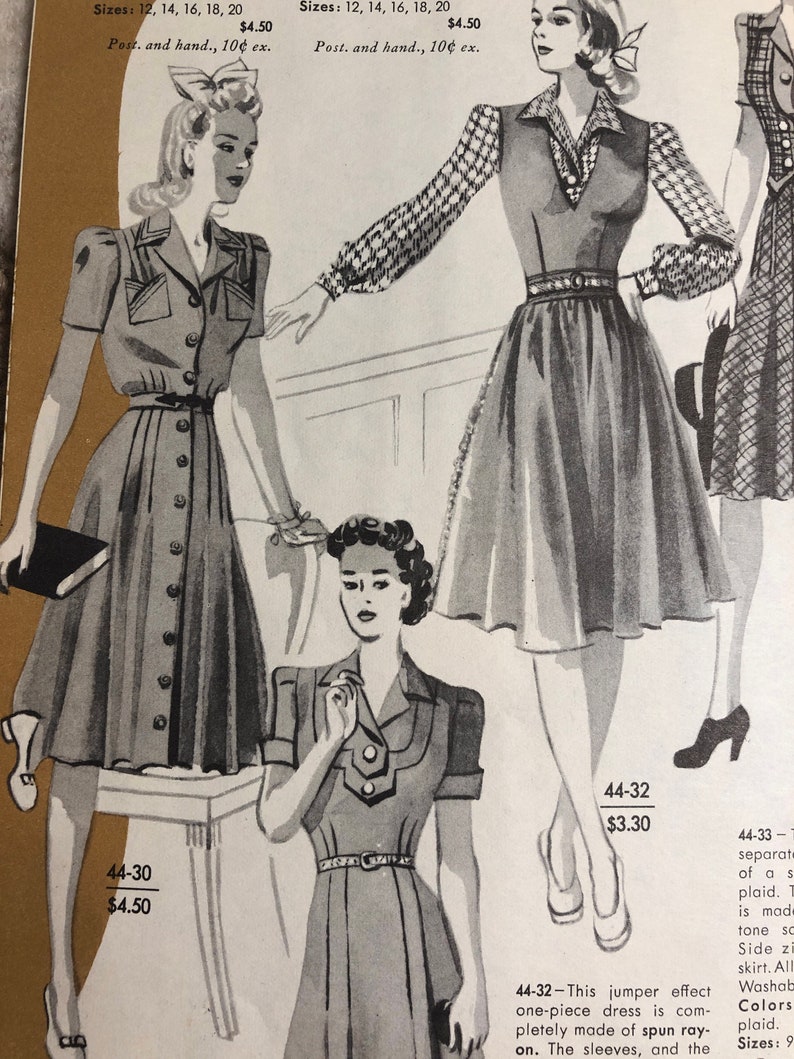 May include: A vintage sewing pattern for a jumper dress with a collared neckline and short sleeves. The pattern is available in sizes 12-20 and costs $4.50. The pattern is shown on three models wearing the dress.