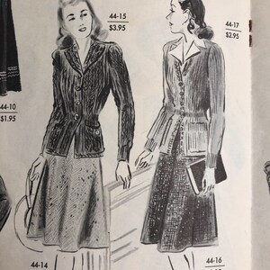 May include: Two women's fashion illustrations, one wearing a black cardigan with a white collar and a skirt, the other wearing a beige cardigan with a white collar and a skirt. Both illustrations have a price tag and a number next to them.