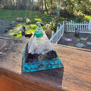 Custom Healing Pyramids using a variety of healing crystals add color changing light bar  to give it the ultimate night light effect