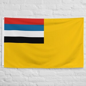 May include: A yellow flag with a red, blue, white, and black horizontal stripe design in the upper left corner.