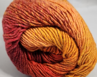 Mellila yarn from Cascade, orange to cranberry fade, color 18