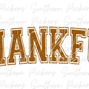 May include: A distressed brown graphic with the word "THANKFUL" in a vintage collegiate font style.