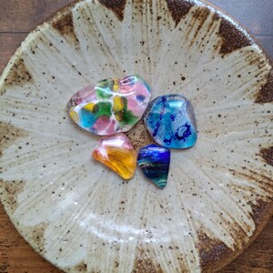 Set of 4 small glass pebbles, glass nuggets