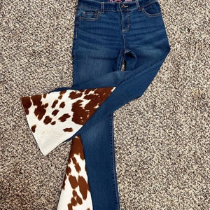 Custom made flare jeans with cow print insert