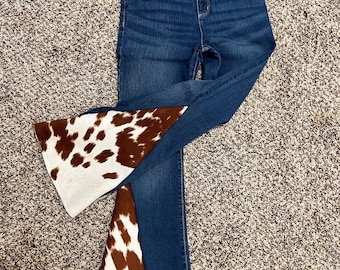 Custom made flare jeans with cow print insert