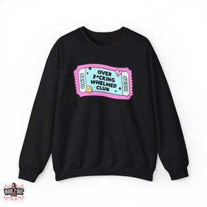 May include: Black sweatshirt with a pink and blue ticket design that says "Over F*cking Whelmed Club".