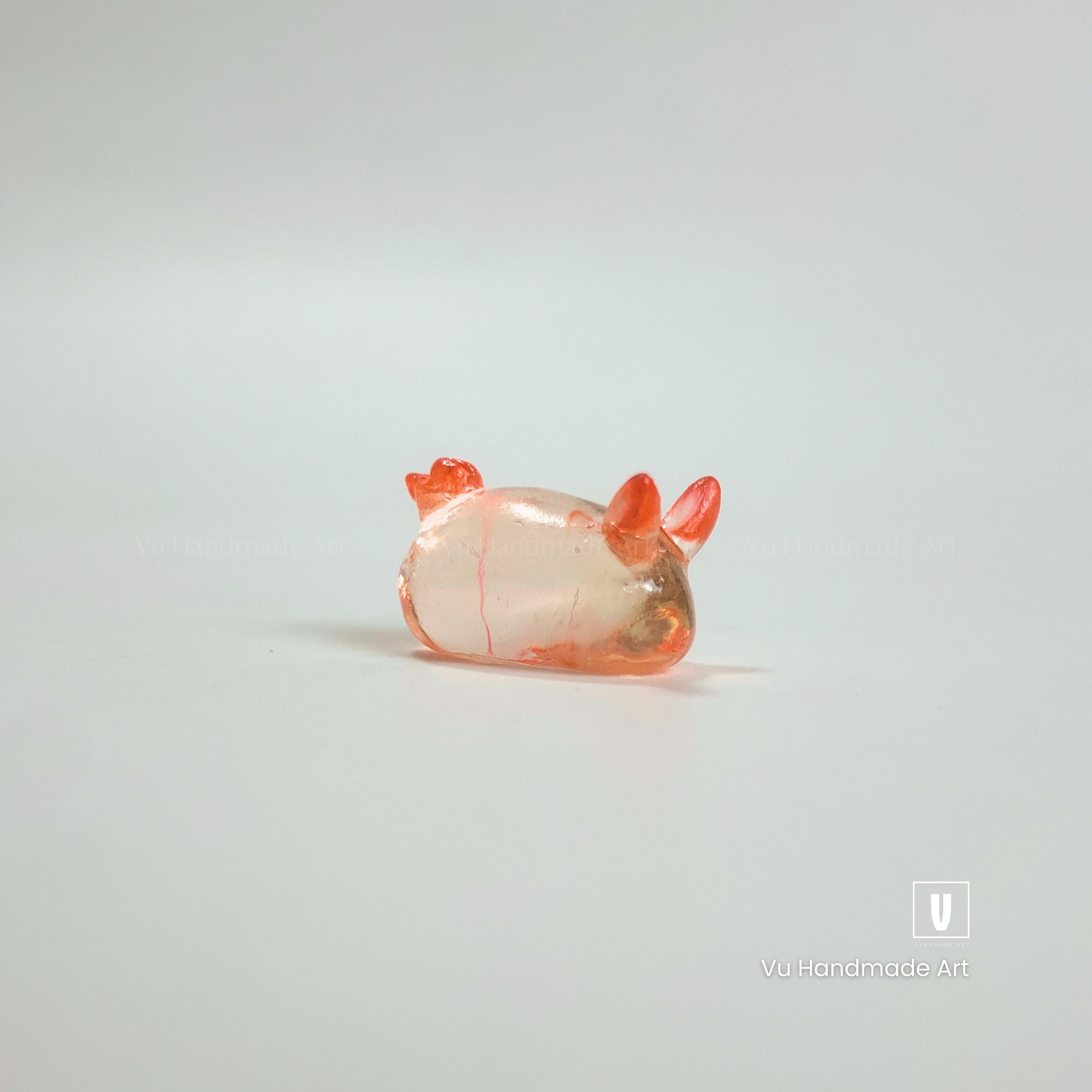 Handcrafted Clear Orange Sea Bunny Nudibranch Figurine: Epoxy Resin Marine Decor