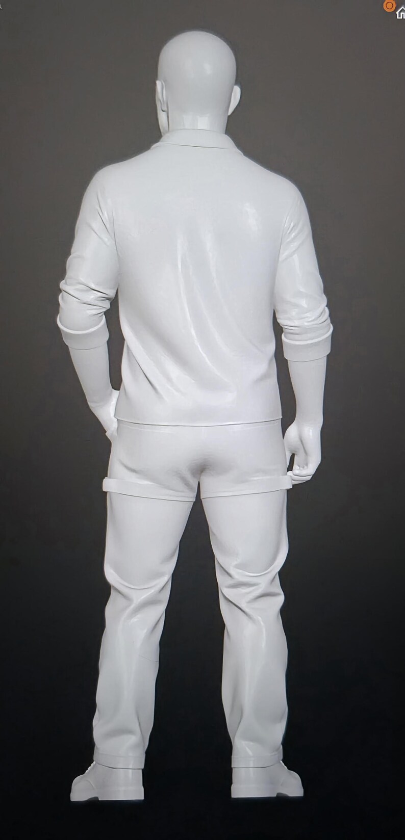 May include: A full-body white mannequin standing in a rear-facing position. The mannequin is wearing a long-sleeved collared shirt with sleeves pushed up to the elbows, paired with fitted trousers that feature a horizontal seam detail at the mid-thigh.