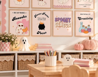 May include: Eight framed wall art prints featuring Halloween-themed illustrations of ghosts, pumpkins, a cauldron, and potions with text including Let the Ghoul Times Roll, Peek a Boo, No Tricks just Treats, Boo Crew, Booooks, Hocus Focus, Spooky Season, and Brewing Up Creativity.