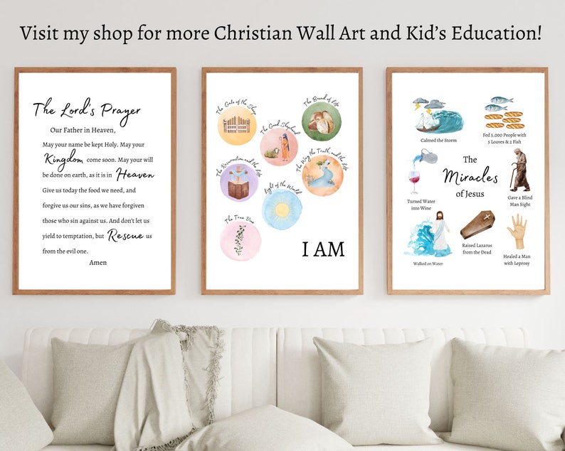 Three framed watercolor prints with Christian themes. The first print features the Lord's Prayer with the words 'Our Father in Heaven, May your name be kept Holy. And don't let us yield to temptation, but Rescue us from the evil one. Amen.' The second print features a circle with the words 'I AM' in the center and other circles around it with phrases like 'The Bread of Life', 'The Good Shepherd', 'The Resurrection and the Life', 'The True Vine', and 'The Light of the World.'