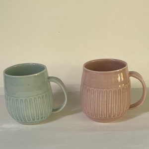 A set of Pink and blue shinogi (vertical lined) porcelain mugs, handmade ceramic coffee mug, hand thrown cup