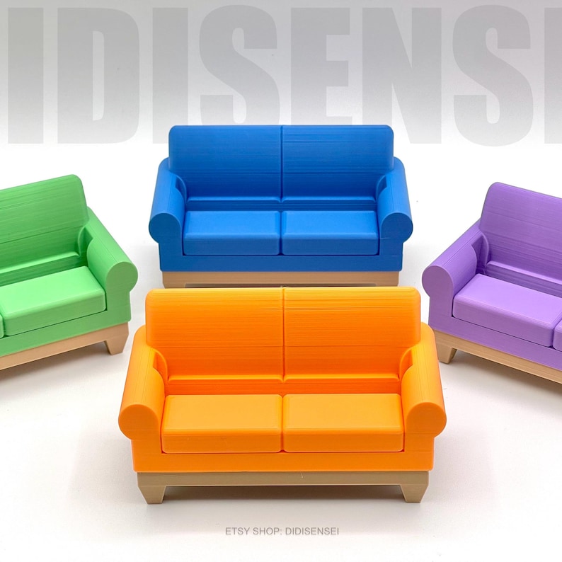 May include: Four miniature couches in different colors: green, blue, orange, and purple. Each couch has a simple design with rounded edges and wooden legs. The couches are arranged in a row on a white surface. The text "ETSY SHOP - DIDISENSEI" is visible at the bottom of the image.