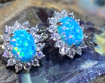Heart&#39;s Art Australia- Play of Colour - Sterling Silver Created 8x6mm Solid Blue Fire Opal Halo stud earrings- Great Gift for everyday wear!