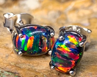 Heart's Art Australia- Play of Color - Pair of Sterling Silver Created 7x5mm Solid Fire Black Opal stud earrings- Great Gift for everyday!