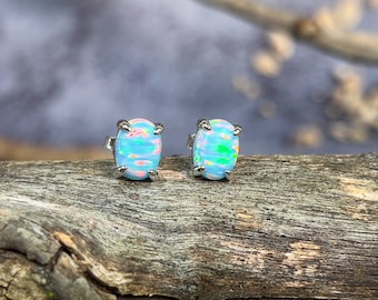Heart&#39;s Art Australia- Play of Colour- Sterling Silver Created 8x6mm Solid Light Blue Fire Opal stud earrings- Great Gift for everyday wear!
