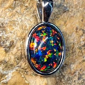 Heart's Art Australia- Play of Colour - Sterling Silver 10x8mm Solid Red Green Black created Opal bezel set pendant- Great Gift for women!