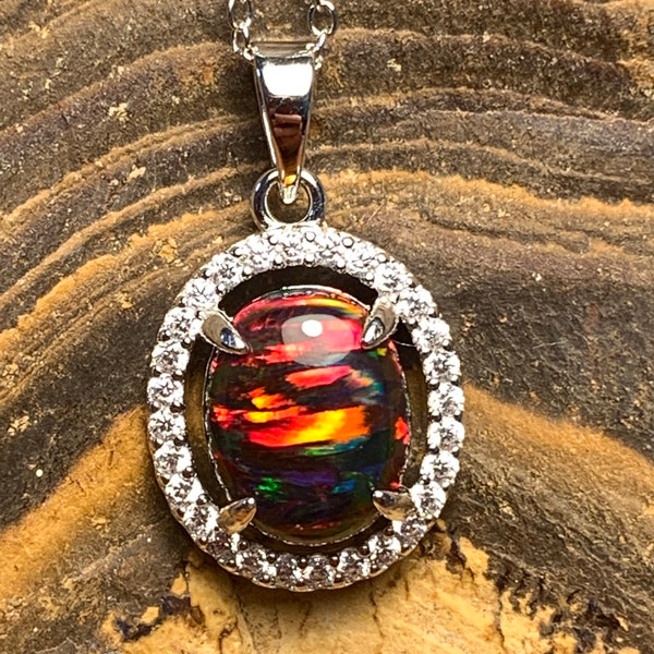 Play of Colour Australia- Volcanic Elegance Pendant - Solid Lab Made Red Black Opal in Sterling Silver - 10x8mm Unique Jewelry line pattern