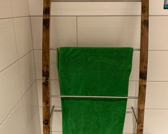 Porte-serviette fabriqué à partir de vieilles douelles et d'acier inoxydable