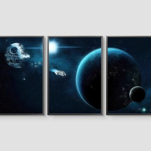 May include: A three-panel canvas print depicting a space scene with a large, round, blue planet, a smaller, round, gray planet, and a white spaceship flying through a dark blue nebula. The Death Star is visible in the top left corner of the image.