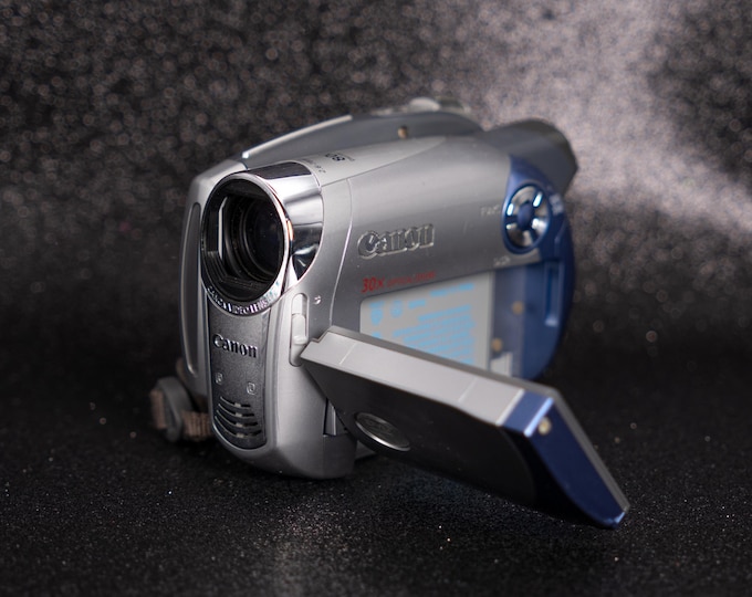 Featured listing image: Canon DC201 - Y2K Camcorder - 30x Optical Zoom - Mini DVD - Fully Working - New battery, Charger & DVD Included