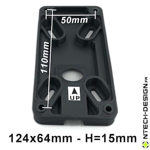 May include: Black rectangular plastic component, 12.4cm x 6.4cm and 1.5cm high. It has multiple slotted openings, a central hole, and an "UP" arrow. The image also shows dimensions of 50mm x 110mm.
