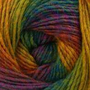May include: Close-up of a skein of yarn with a vibrant rainbow color gradient. The yarn transitions from orange to yellow, green, blue, and purple. The yarn is tightly wound, showing the texture of the fibers.