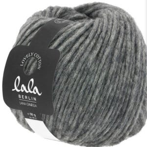 May include: A ball of gray yarn with a label that reads "lola BERLIN LANA GRASSA e 50 g"