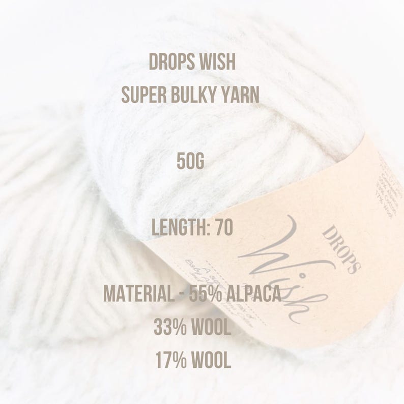 May include: A ball of white Drops Wish Super Bulky yarn with a brown label that reads "Drops Wish" and lists the yarn's composition as 55% alpaca, 33% wool, and 17% wool. The label also states that the yarn weighs 50 grams and has a length of 70 meters.