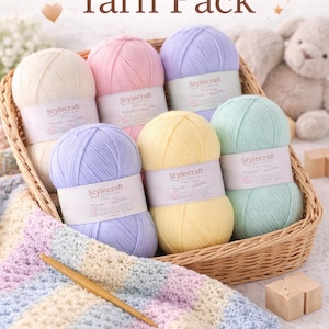 May include: A wicker basket filled with pastel-colored yarn balls, labeled "Stylecraft." A crocheted baby blanket and wooden crochet hook are in the foreground. The text "Baby Blanket Yarn Pack" is at the top.