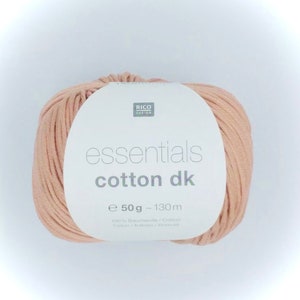 May include: A ball of light pink cotton yarn labeled "essentials cotton dk" with the brand name "RICO DESIGN" and the details "e 50g - 130m 100% Baumwolle/Cotton Coton/Katoen Bomuld".