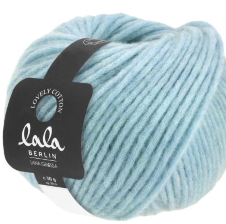 May include: A ball of light blue yarn with a black label that says "lala Berlin Lana Grossa" and "Lovely Cotton".