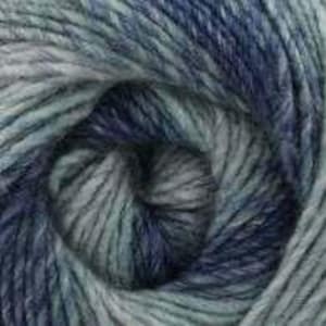 May include: Close-up of a ball of yarn in shades of blue, teal, and gray. The yarn is tightly wound, revealing a spiral pattern. The texture appears soft and slightly fuzzy, suggesting a blend of natural fibers.