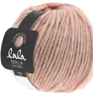 May include: A ball of pink and beige yarn with a label that reads "lala BERLIN LANA GROSSA e 50 g"