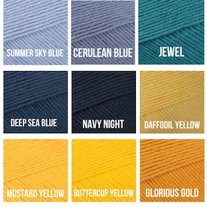 May include: Nine skeins of yarn in various colors are displayed. Colors include Summer Sky Blue, Cerulean Blue, Jewel, Deep Sea Blue, Navy Night, Daffodil Yellow, Mustard Yellow, Buttercup Yellow, and Glorious Gold. Each color is labeled.