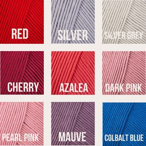 May include: A color chart showing yarn samples in various colors, including red, silver, silver grey, cherry, azalea, dark pink, pearl pink, mauve, and cobalt blue.