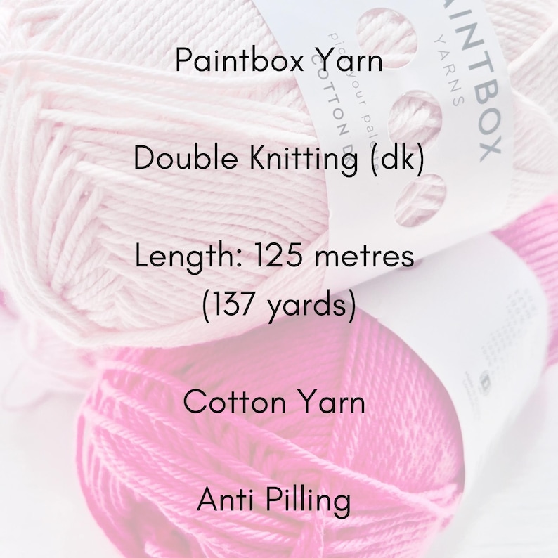 May include: Close-up of two skeins of yarn in shades of pink. The labels read "Paintbox Yarn", "Double Knitting (dk)", and "Cotton Yarn". The length is 137 yards. The text "Anti Pilling" is also visible.