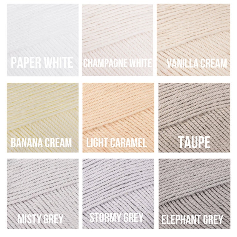May include: Nine skeins of yarn in various neutral colors. The colors include Paper White, Champagne White, Vanilla Cream, Banana Cream, Light Caramel, Taupe, Misty Grey, Stormy Grey, and Elephant Grey. Each skein has a label with the color name.