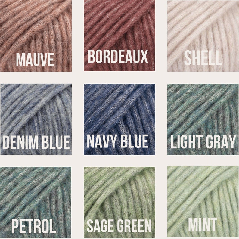 May include: Nine yarn skeins in different colors, including mauve, bordeaux, shell, denim blue, navy blue, light gray, petrol, sage green, and mint.