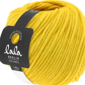 May include: A ball of yellow yarn labeled "lala Berlin Lana Grossa Lovely Cotton" with a white label indicating 50g and 95m.