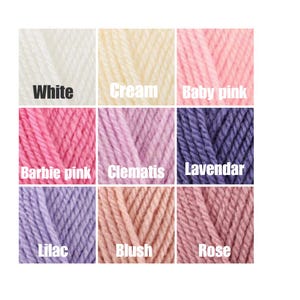 May include: A color palette of nine yarn samples in various shades. Colors include white, cream, baby pink, Barbie pink, clematis, lavender, lilac, blush, and rose. Each color is labeled with its name in a bold, black font.