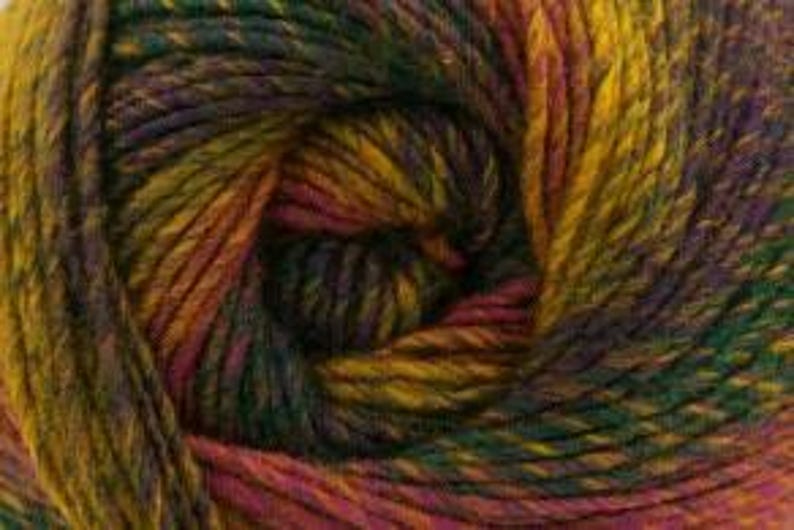 May include: Close-up of a ball of yarn with a blend of colors including yellow, green, purple, and red. The yarn is tightly wound, showing the texture and individual strands. Ideal for knitting or crocheting projects.