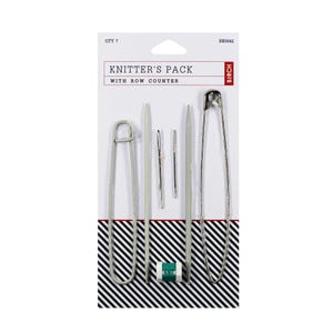 May include: Knitter's Pack with Row Counter by Birch. The pack includes two silver knitting needles, two silver stitch holders, and a silver row counter.