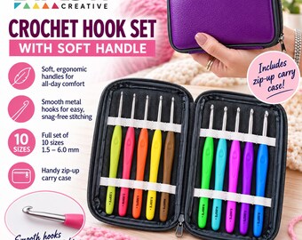 May include: A Birch Creative crochet hook set featuring ten metal hooks with colourful, soft ergonomic handles in sizes 1.5 to 6.0 mm. The set is organised in a black interior case with elastic loops and includes a purple zip-up carry case.