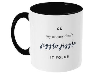 My money don’t jiggle jiggle, it folds funny mug. White 11oz. Great novelty gift. Two tone, colours available.