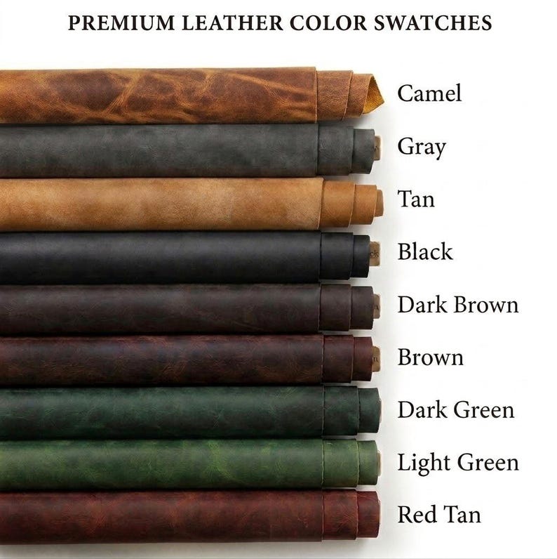 A collection of rolled leather sheets in various colors, including red tan, light green, dark green, brown, dark brown, black, tan, gray, and camel. The colors are labeled with text. The leather appears to be of high quality.